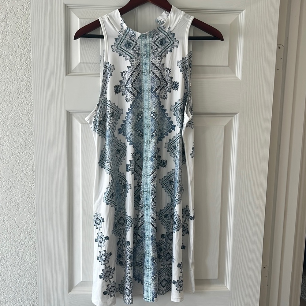 Sleeveless high neck dress. Altar’d State
